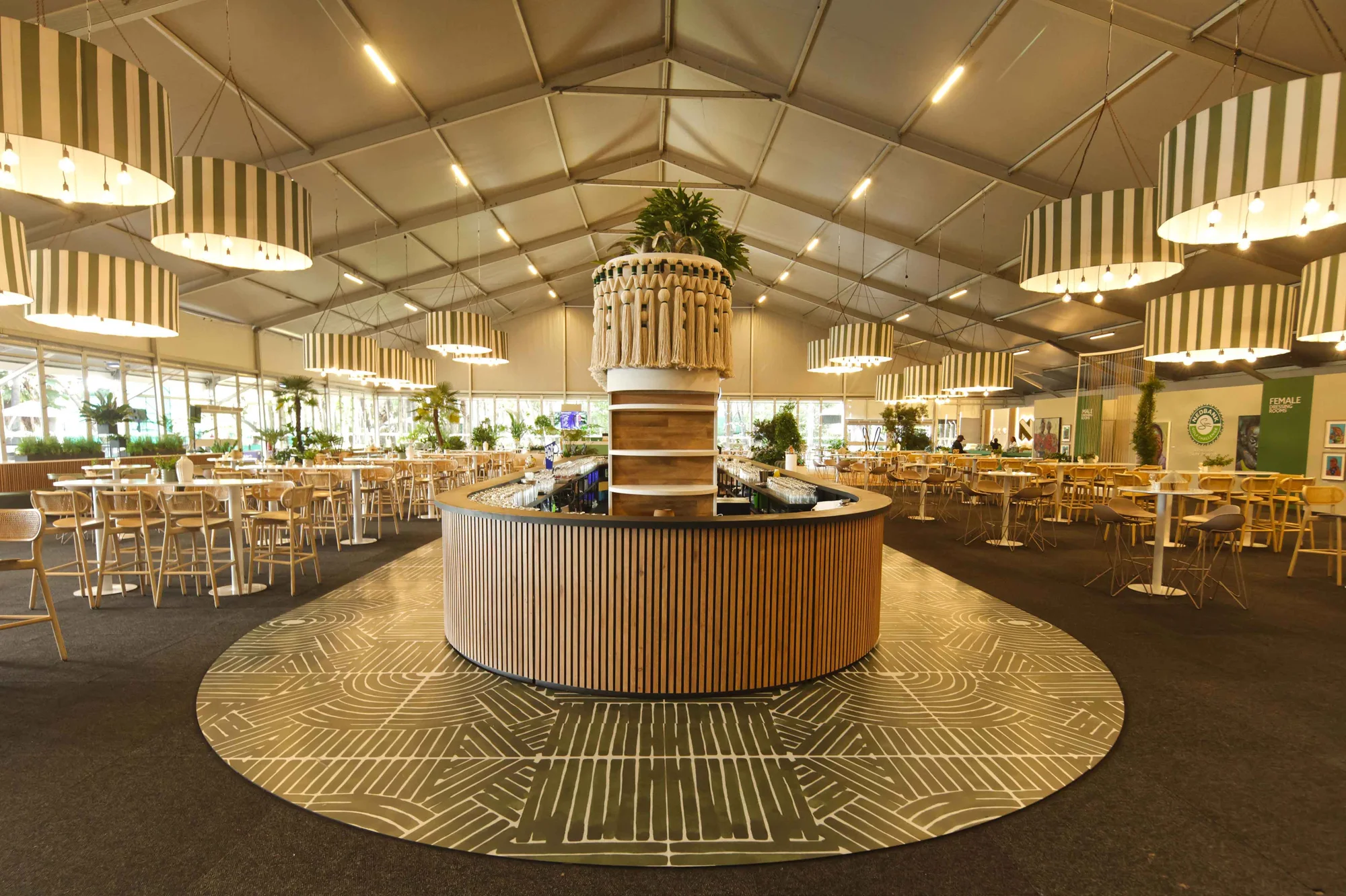 Central bar and seating in a Nedbank Golf Challenge hospitality pavilion